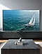 A 98 inch Supersize TV is placed in the living room area displaying a sail boat.