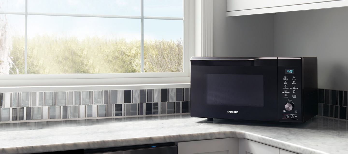 View of a Samsung Microwave Oven on a kitchen surface from a front right perspective