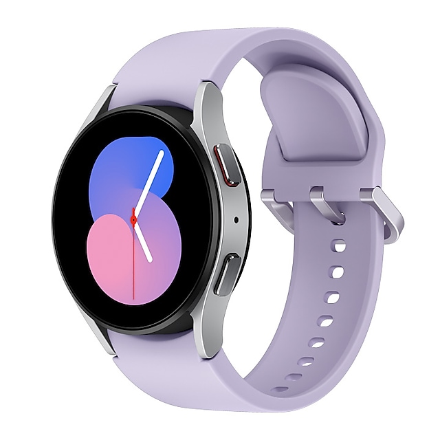 A silver Galaxy Watch5 with a purple sport band is shown at a tilted angle.