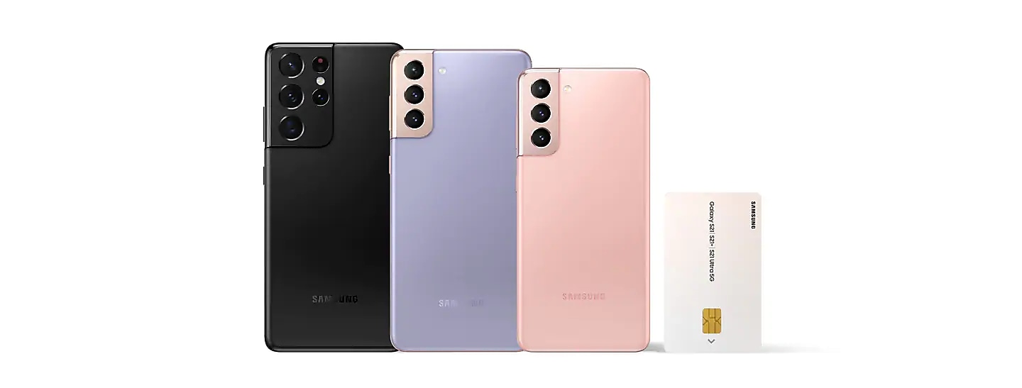 Black S21 ultra, violet S21+, and pink S21 are standing with showing their backs. On the right, there is a credit card in order to compare their sizes.