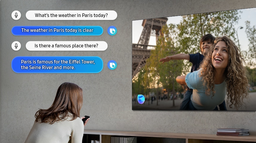 In un soggiorno, una donna parla con Bixby attraverso il TV. Vengono mostrati i sottotitoli del dialogo. Che tempo fa oggi a Parigi? Oggi a Parigi il tempo è sereno. Quali sono i luoghi d'interesse più famosi in città? Parigi è famosa per la Torre Eiffel, la Senna e molto altro.