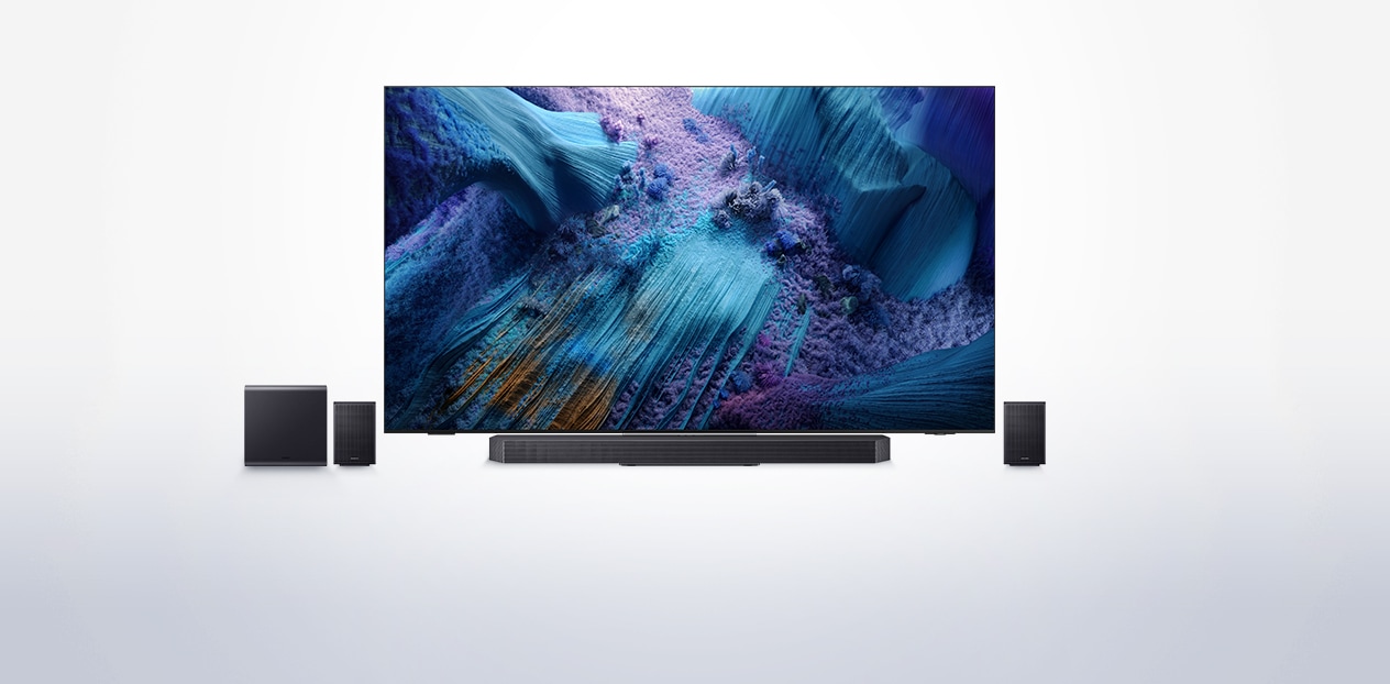 A Samsung Neo QLED TV with a soundbar, a subwoofer and two rear speakers.