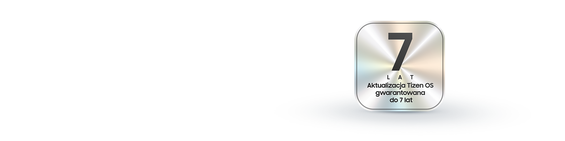 Metalowa plakietka z napisem „7 lat aktualizacji systemu operacyjnego za darmo” pogrubioną czcionką.
