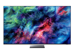A Samsung Micro RGB R95H TV displays colorful, abstract landscape on screen.