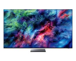 A Samsung Micro RGB R95H TV displays colorful, abstract landscape on screen.