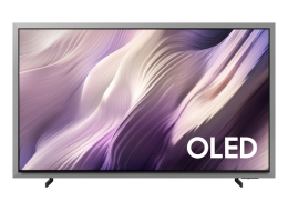 A Samsung Micro RGB R85H TV displays colorful, abstract landscape on screen.