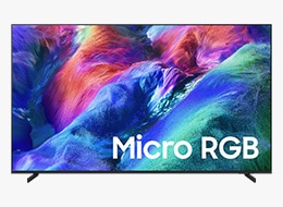 A Samsung Micro RGB R85H TV displays colorful, abstract landscape on screen.