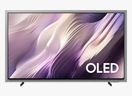 A Samsung OLED S95H TV displays white abstract landscape tinged in purple on screen.