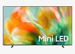 A Samsung Mini LED M80H TV displays abstract landscape in blue and red tones on screen.