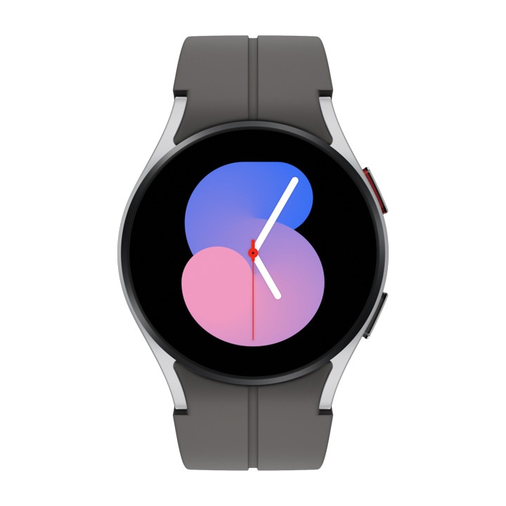 A silver Galaxy Watch5 with a grey D-Buckle sport band is shown.
